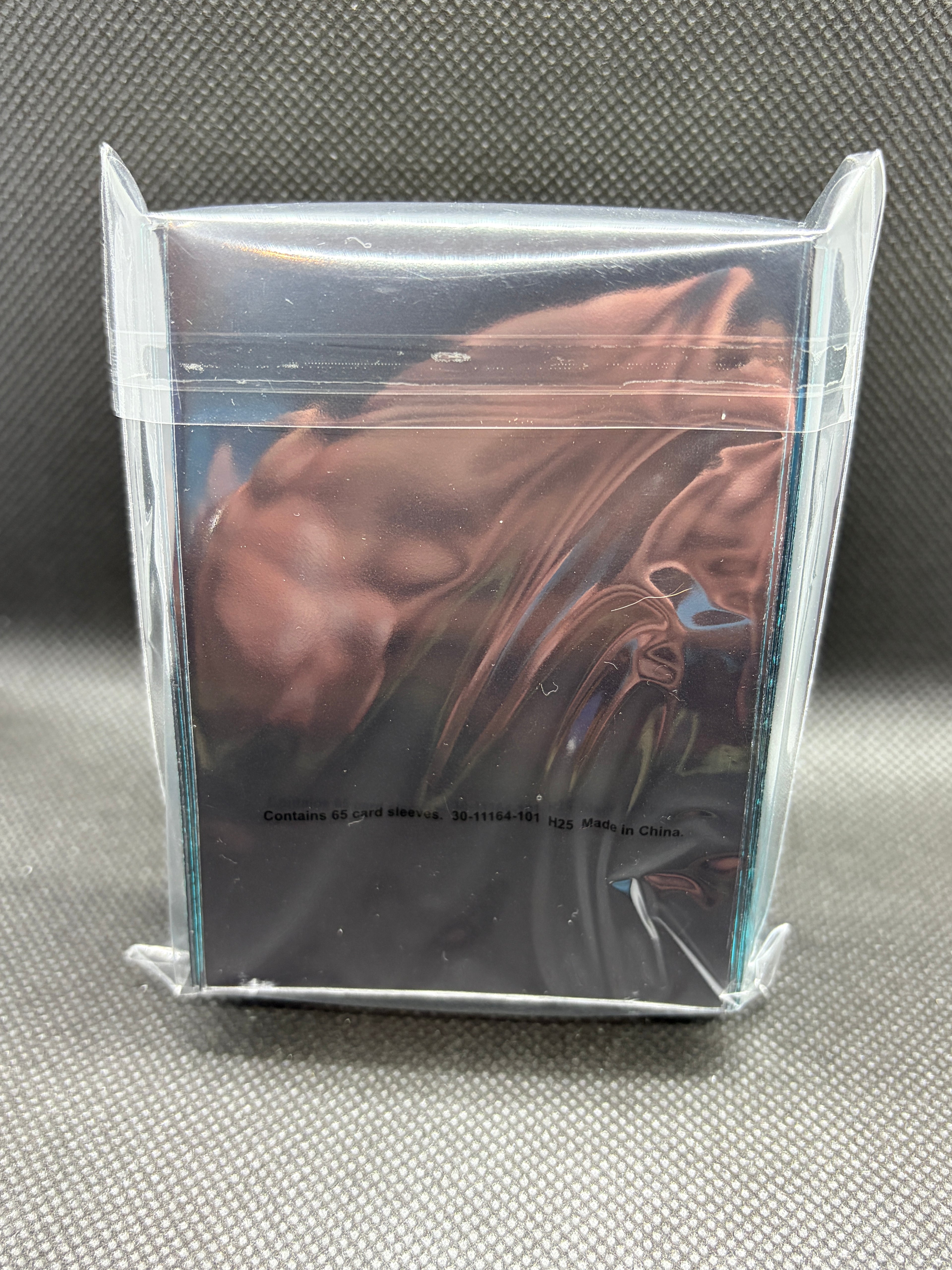 Mega Dragonite Ascended Heroes Premium Card Sleeves. Back view of sealed packet. 
