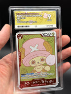 Handheld close-up of Japanese Tony Tony Chopper EB02-003 One Piece card in an ACE 9 Mint slab, showing Chopper’s Volume 1 artwork and grading label